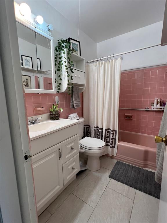 900 Southwest 10th Terrace, Unit S20 Hallandale Beach, FL 33009 - Photo 13 of 20 a bathroom with a sink a toilet and shower