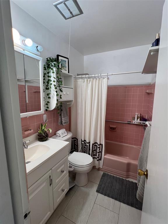 900 Southwest 10th Terrace, Unit S20 Hallandale Beach, FL 33009 - Photo 14 of 20 a bathroom with a sink a toilet and shower