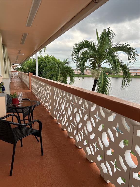 900 Southwest 10th Terrace, Unit S20 Hallandale Beach, FL 33009 - Photo 17 of 20 a view of balcony with furniture