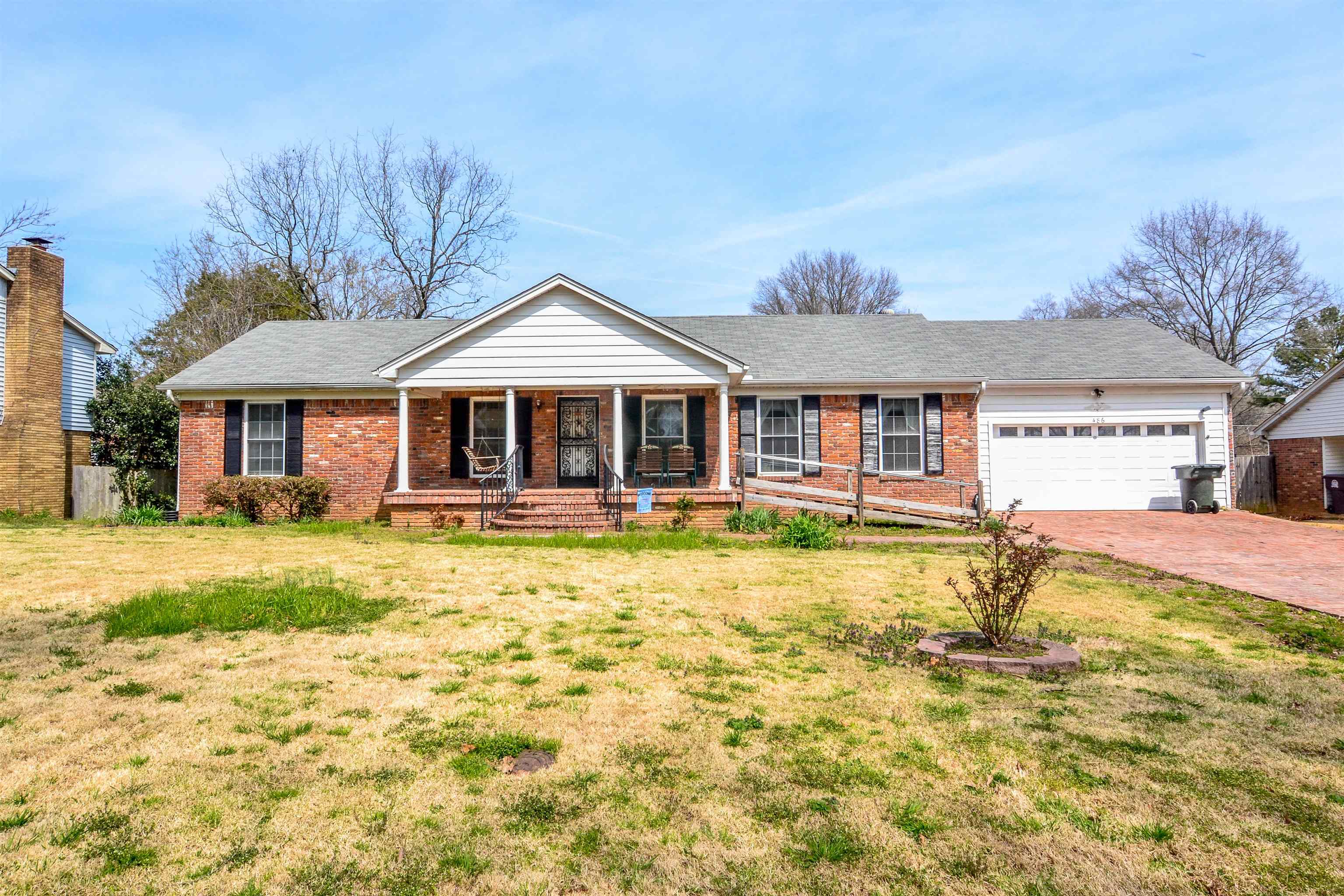 Covered porch & 2-car garage