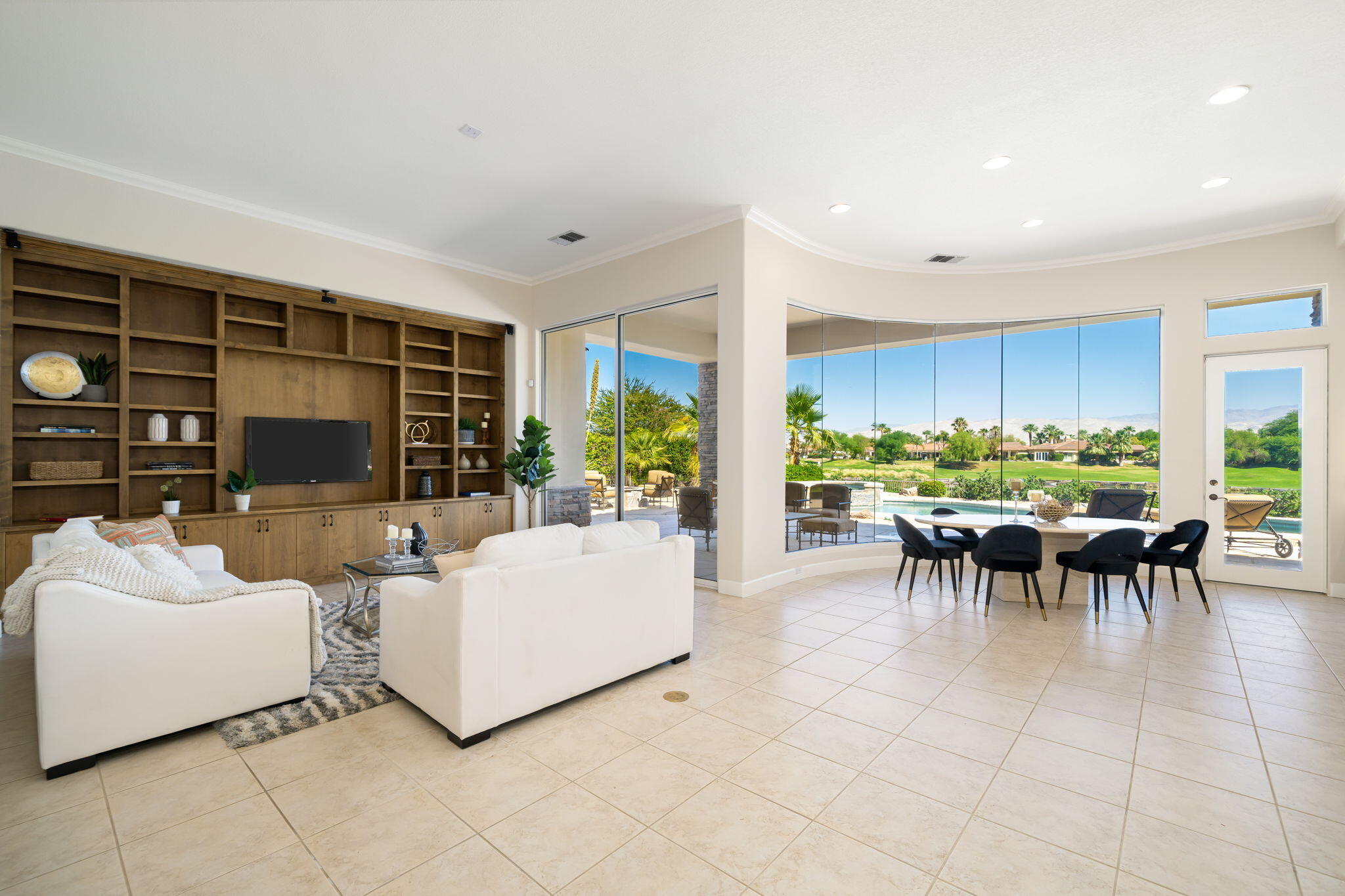 142 Loch Lomond Road Rancho Mirage, CA 92270 - Photo 12 of 62 a living room with furniture and a large window