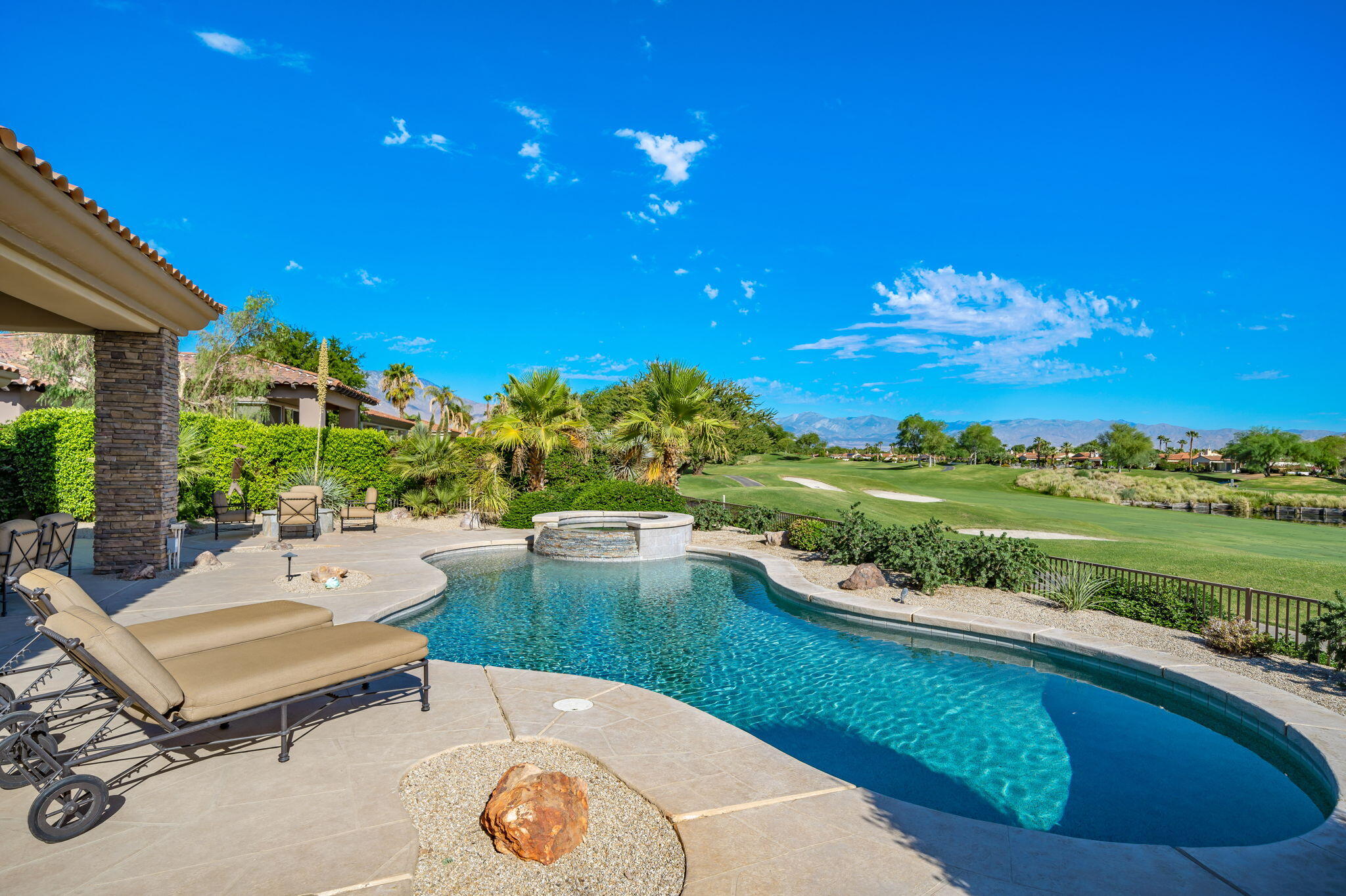 142 Loch Lomond Road Rancho Mirage, CA 92270 - Photo 30 of 62 a terrace with outdoor seating and city view