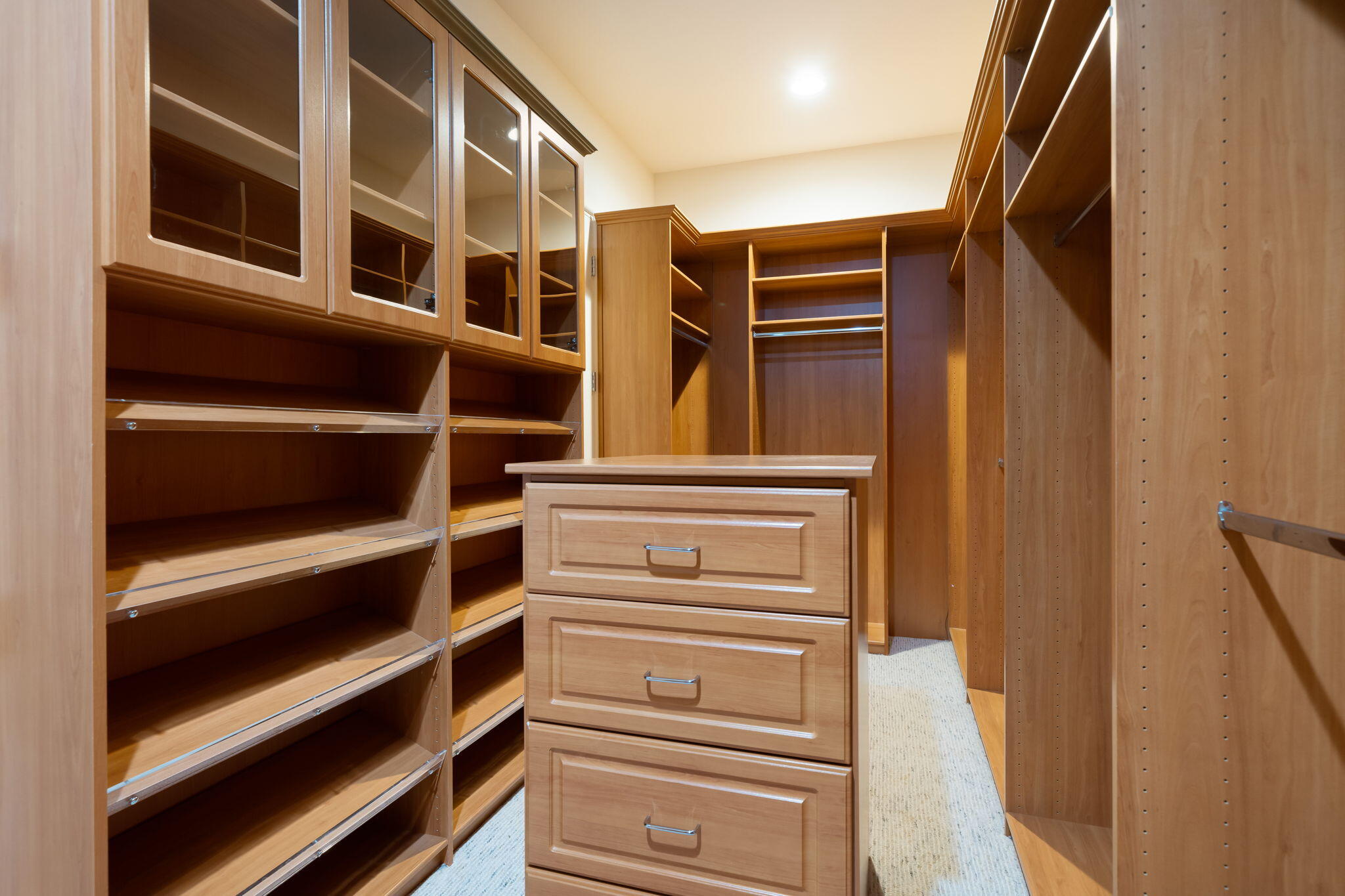 142 Loch Lomond Road Rancho Mirage, CA 92270 - Photo 43 of 62 a view of closet with wooden floor and cabinets