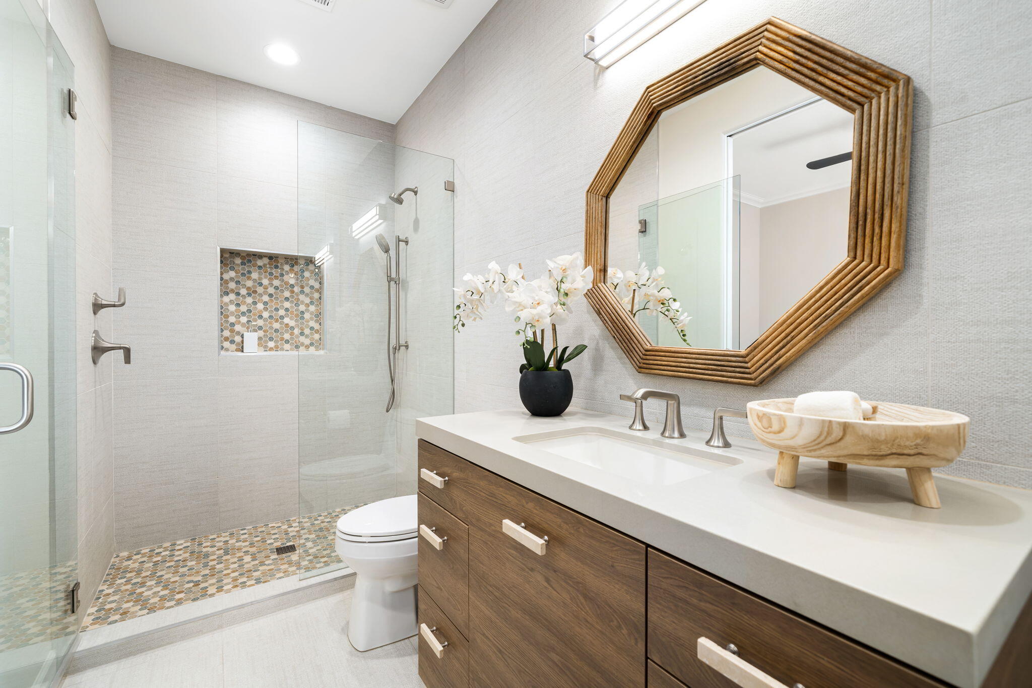 142 Loch Lomond Road Rancho Mirage, CA 92270 - Photo 50 of 62 a bathroom with a toilet sink and mirror