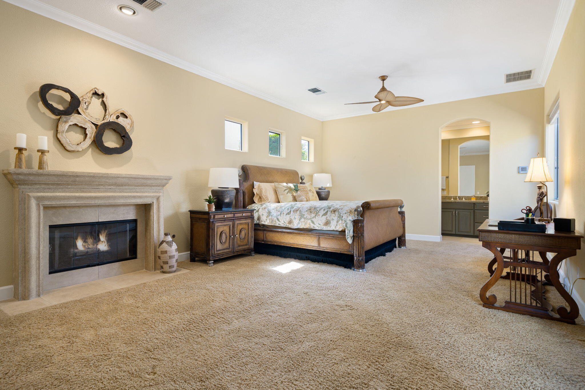 142 Loch Lomond Road Rancho Mirage, CA 92270 - Photo 53 of 62 a living room with a couch and a fireplace