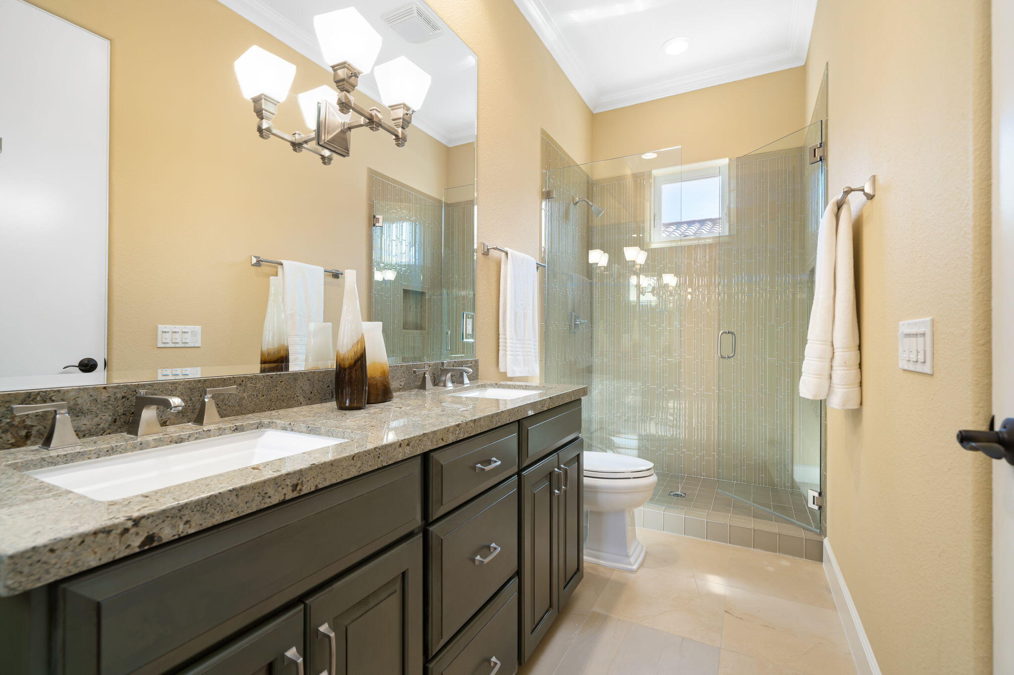 142 Loch Lomond Road Rancho Mirage, CA 92270 - Photo 56 of 62 a bathroom with a granite countertop sink toilet and shower