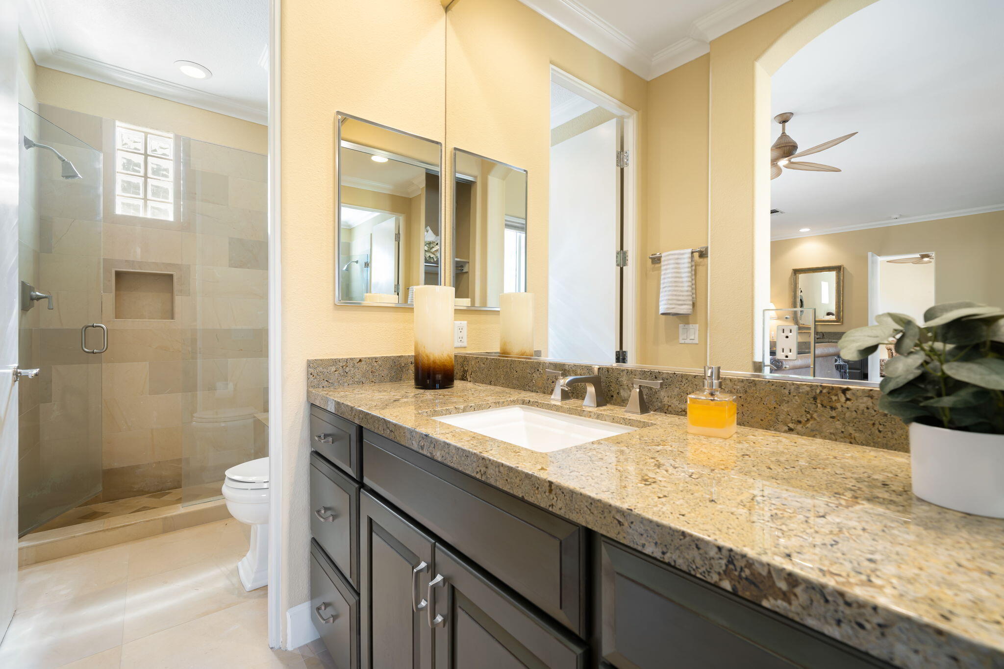 142 Loch Lomond Road Rancho Mirage, CA 92270 - Photo 58 of 62 a bathroom with a granite countertop sink mirror vanity and toilet
