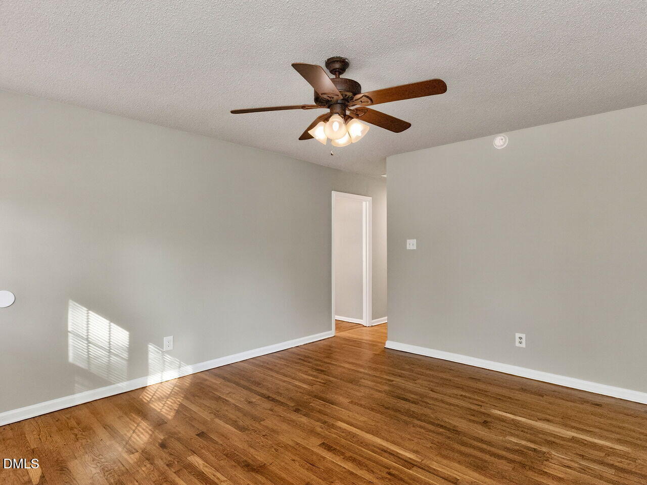 2811 Club Plaza Road Raleigh, NC 27603 - Photo 11 of 38 a view of empty room with wooden floor