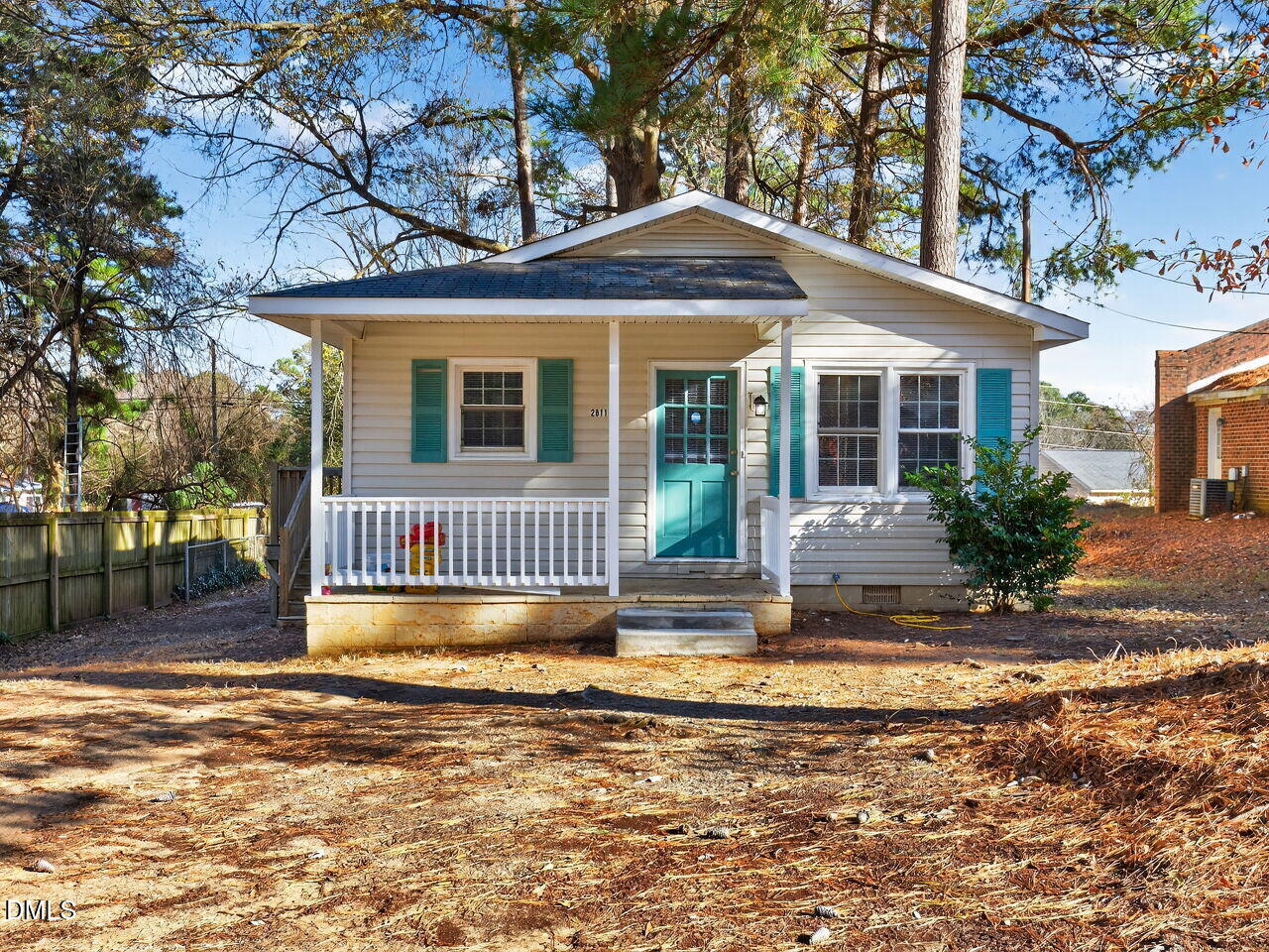 2811 Club Plaza Road Raleigh, NC 27603 - Photo 2 of 38 a front view of a house with a yard