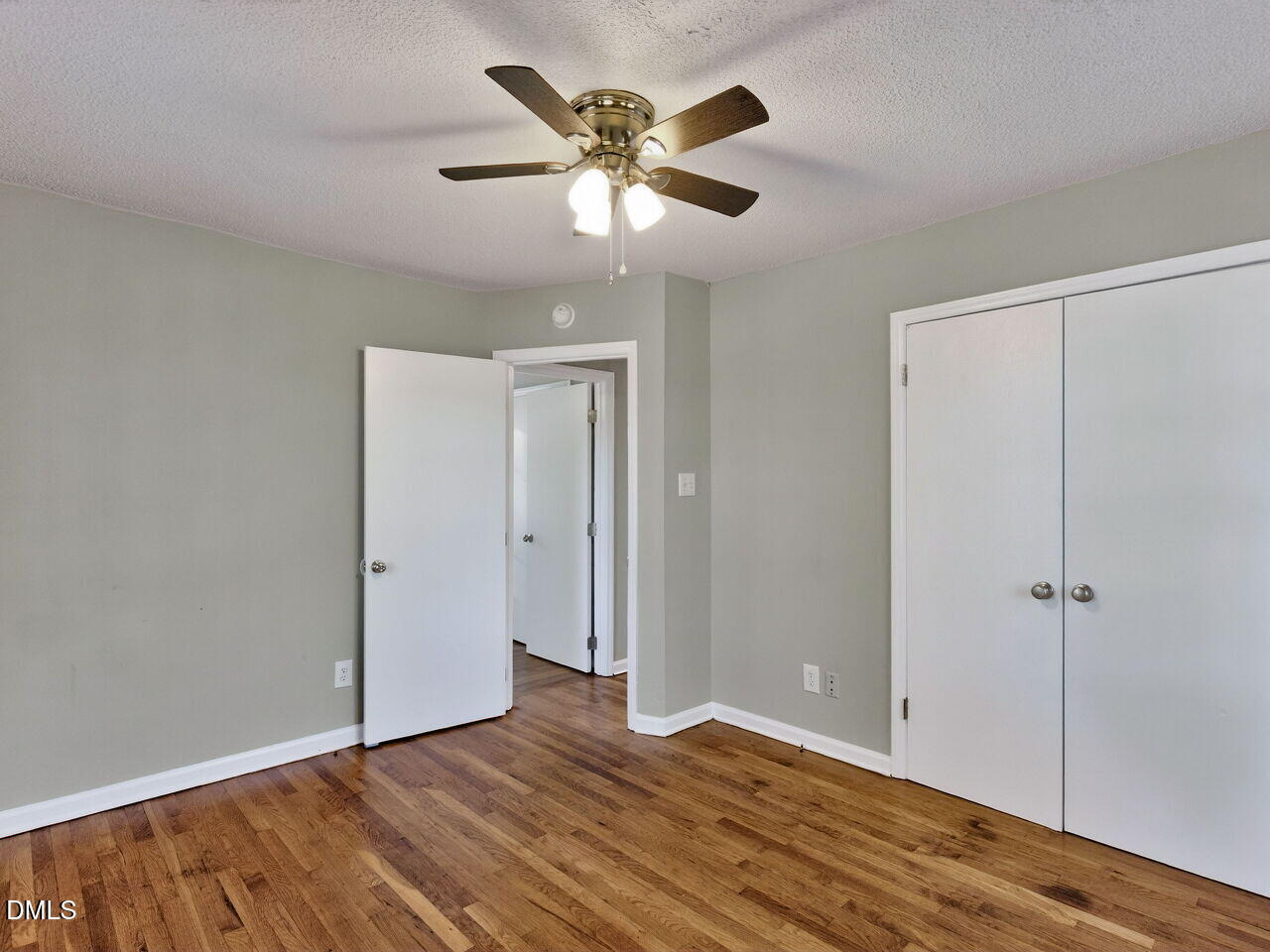 2811 Club Plaza Road Raleigh, NC 27603 - Photo 27 of 38 a view of an empty room with wooden floor