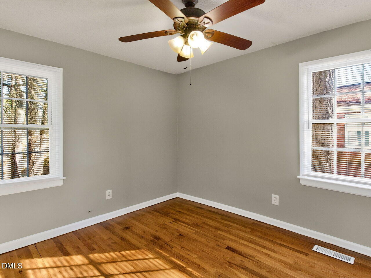 2811 Club Plaza Road Raleigh, NC 27603 - Photo 29 of 38 a view of a room with wooden floor and chandelier fan