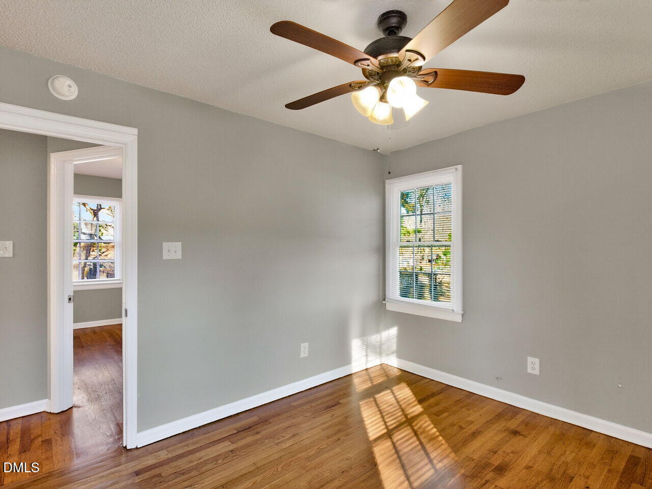 2811 Club Plaza Road Raleigh, NC 27603 - Photo 30 of 38 a view of an empty room with wooden floor and a window
