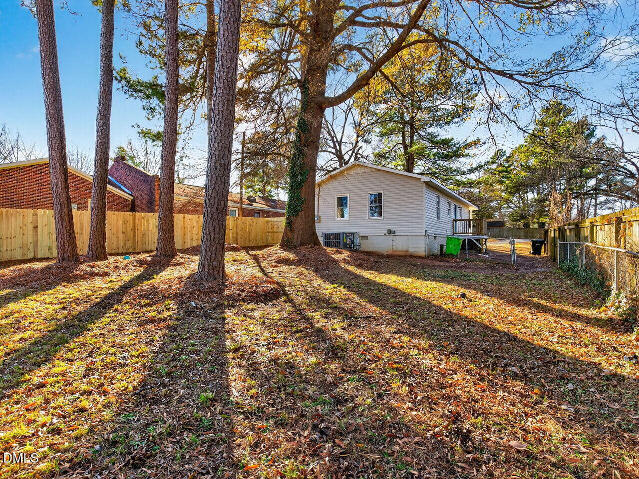 2811 Club Plaza Road Raleigh, NC 27603 - Photo 35 of 38 a white house that has a tree in front of it