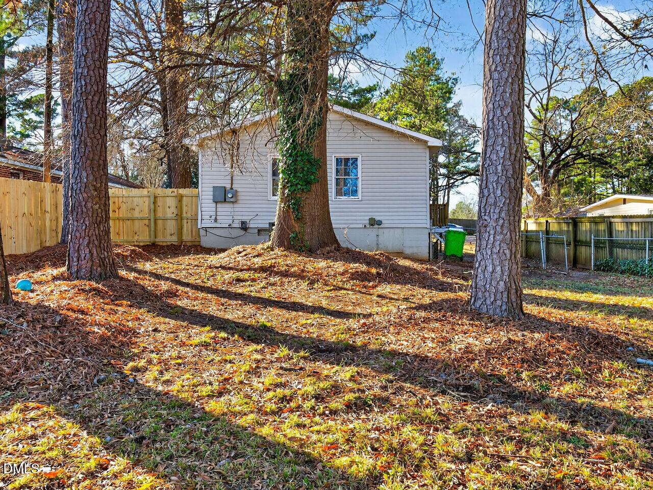 2811 Club Plaza Road Raleigh, NC 27603 - Photo 36 of 38 a backyard of a house with lots of green space