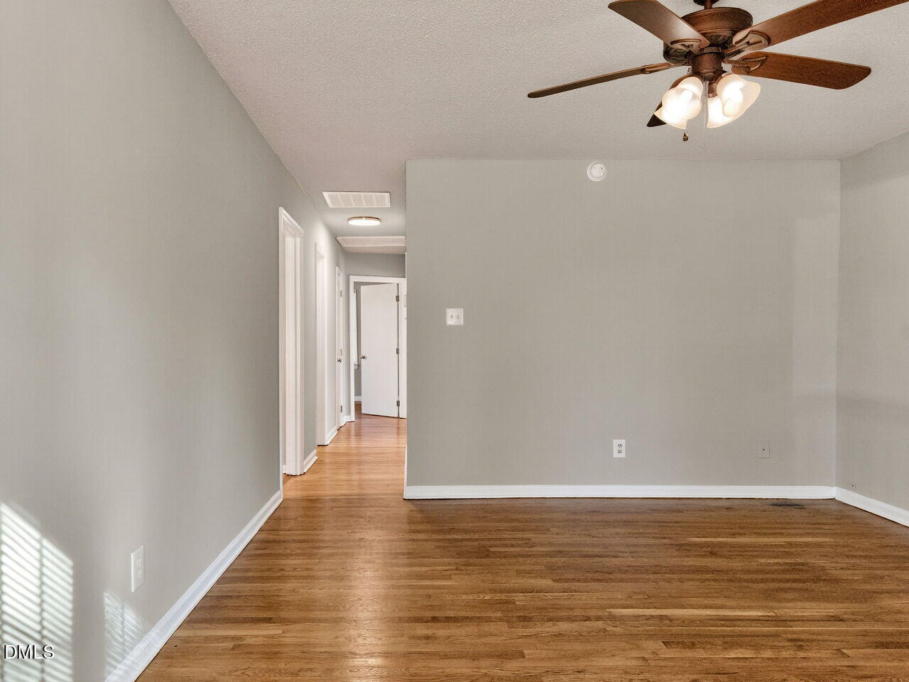 2811 Club Plaza Road Raleigh, NC 27603 - Photo 5 of 38 a view of a room with wooden floor and an entryway