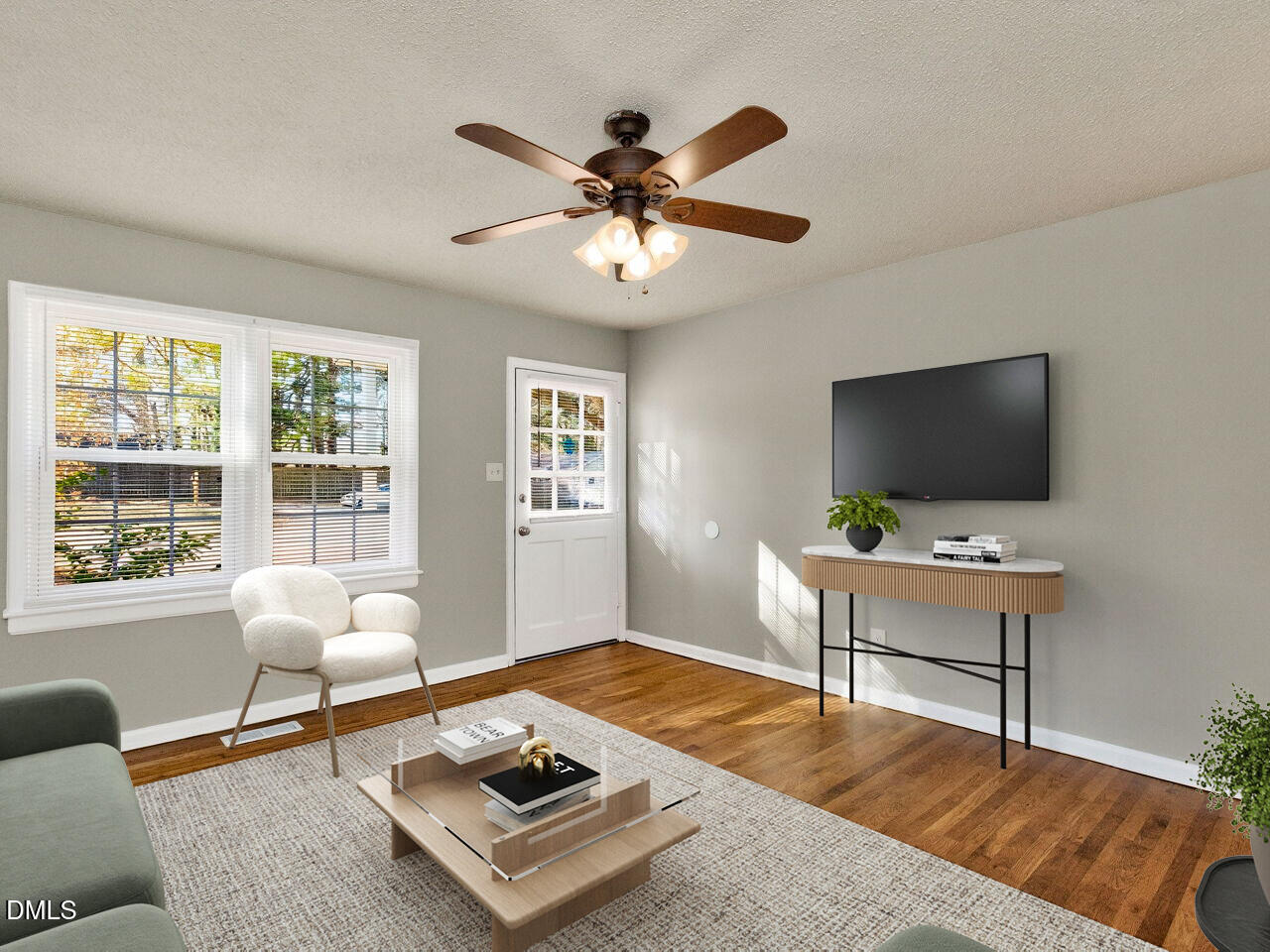 2811 Club Plaza Road Raleigh, NC 27603 - Photo 7 of 38 a living room with furniture and a flat screen tv