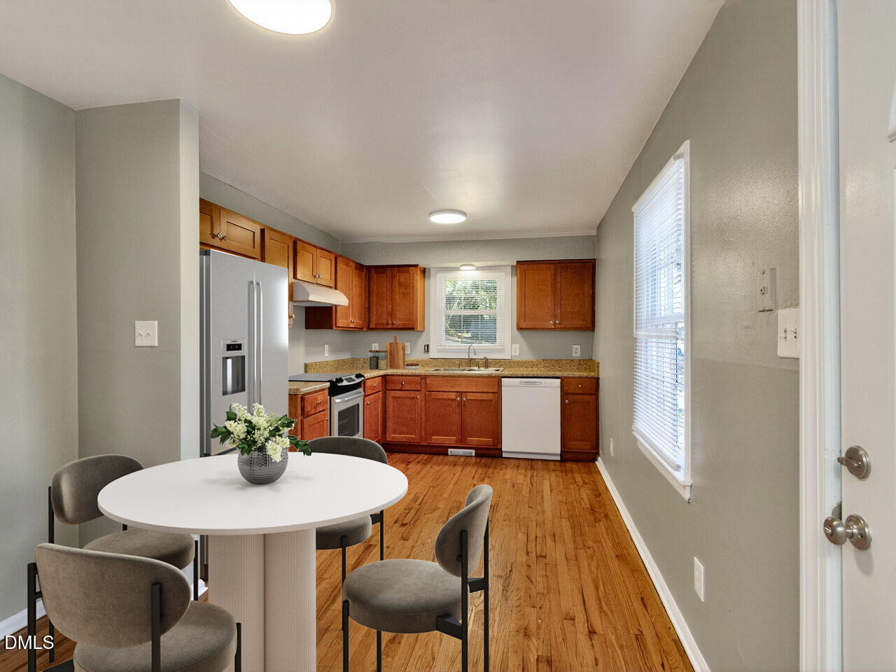 2811 Club Plaza Road Raleigh, NC 27603 - Photo 10 of 38 a kitchen with a table and chairs in it