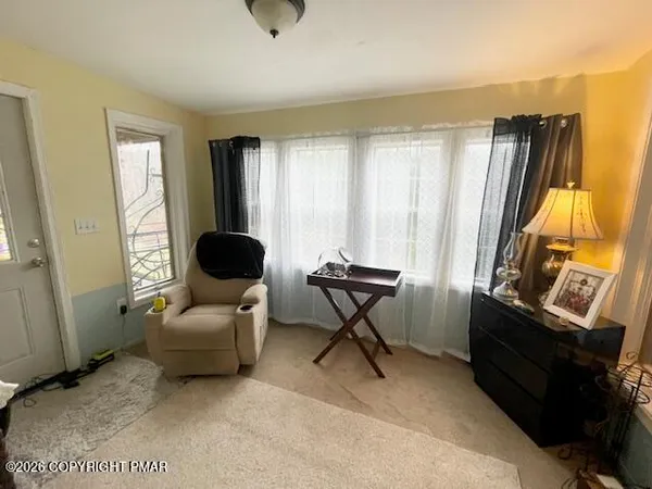 a utility room with dryer washer and other items