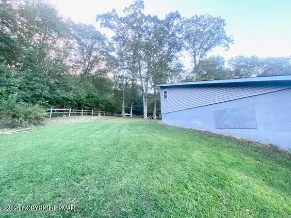 a view of a backyard with a garden