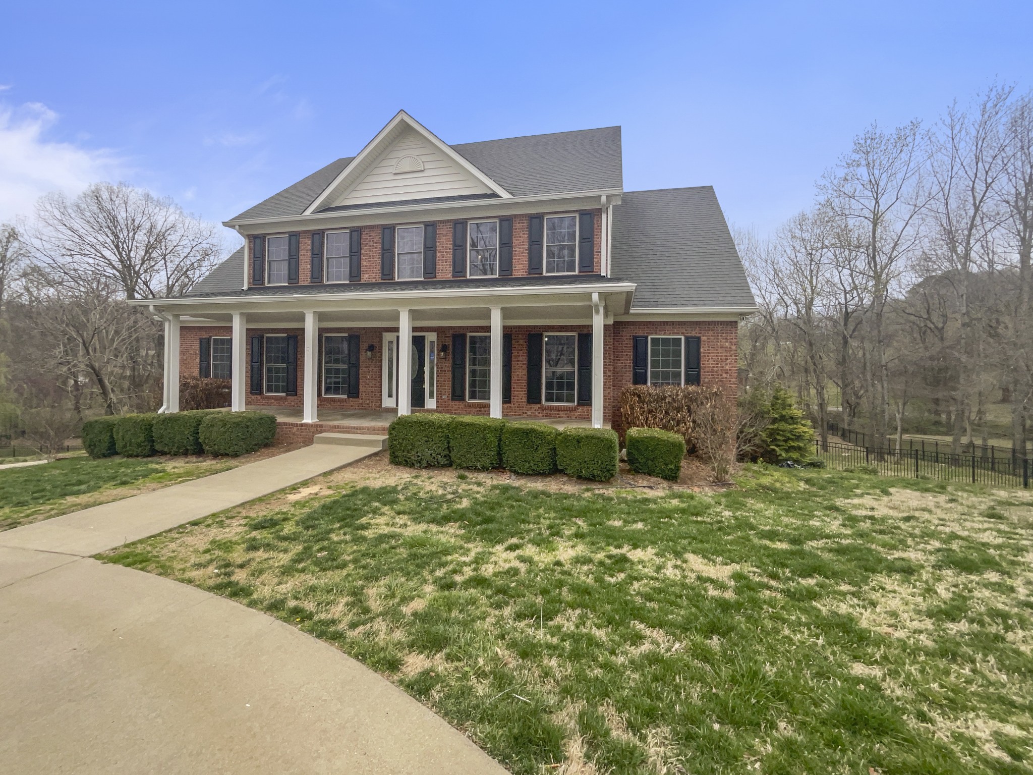 2058 Mossy Oak Circle Clarksville, TN 37043 - Photo 1 of 38 a front view of a house with a yard