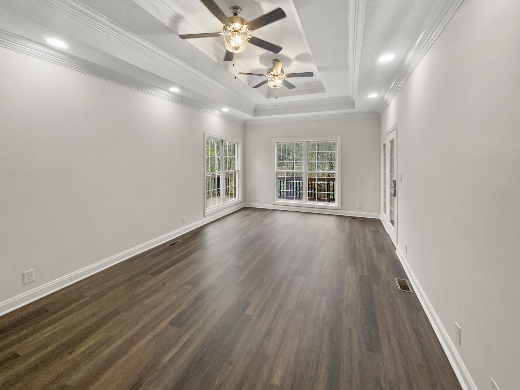 2058 Mossy Oak Circle Clarksville, TN 37043 - Photo 11 of 38 wooden floor in an empty room with a window