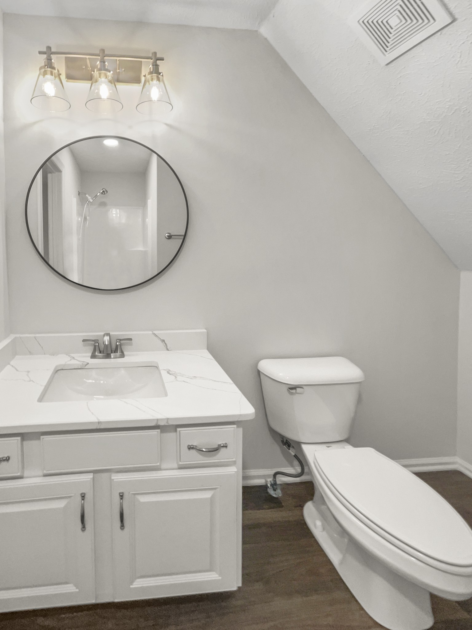 2058 Mossy Oak Circle Clarksville, TN 37043 - Photo 26 of 38 a bathroom with a sink and a mirror