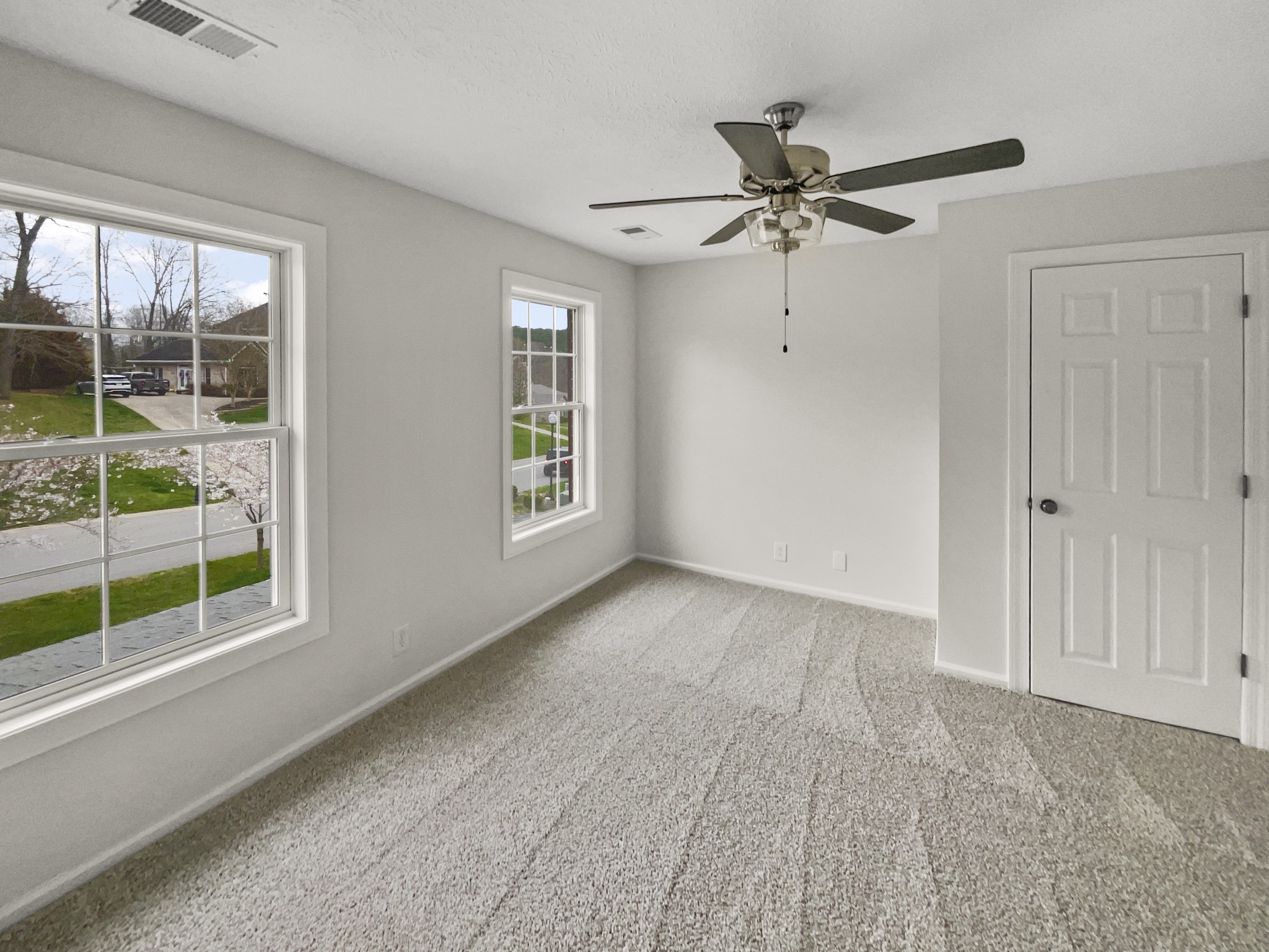 2058 Mossy Oak Circle Clarksville, TN 37043 - Photo 30 of 38 a view of a livingroom with a ceiling fan and window