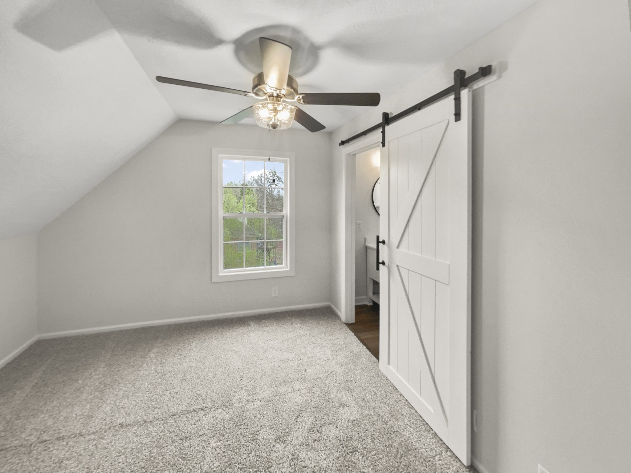 2058 Mossy Oak Circle Clarksville, TN 37043 - Photo 31 of 38 a view of an empty room with a window
