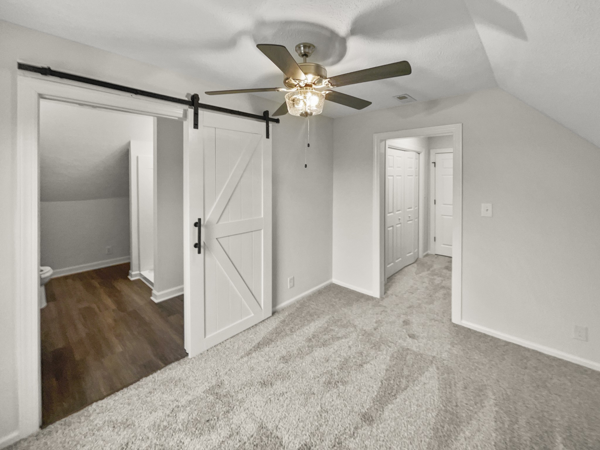 2058 Mossy Oak Circle Clarksville, TN 37043 - Photo 32 of 38 a view of a livingroom with a ceiling fan and closet area