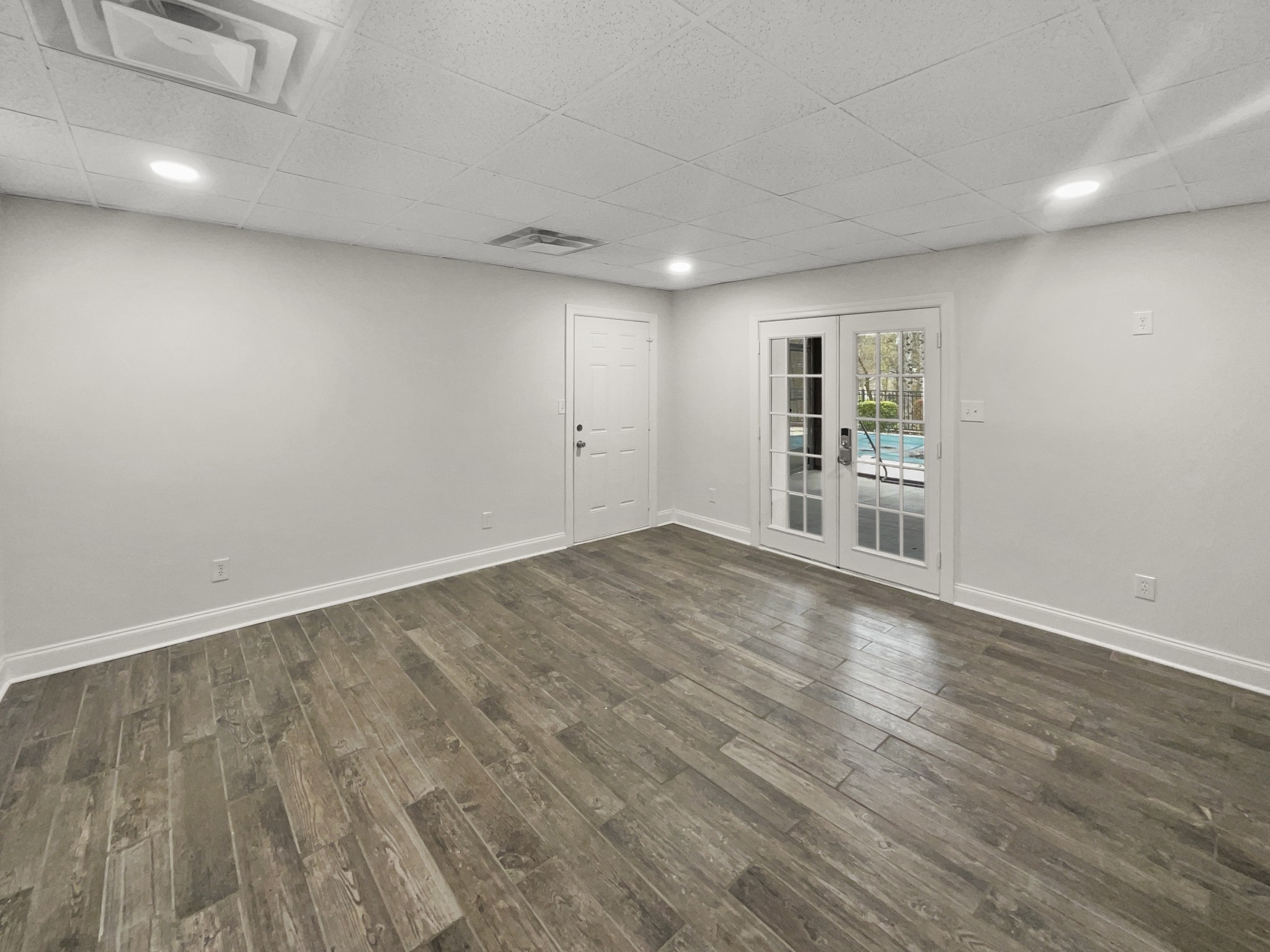 2058 Mossy Oak Circle Clarksville, TN 37043 - Photo 34 of 38 a view of empty room with wooden floor