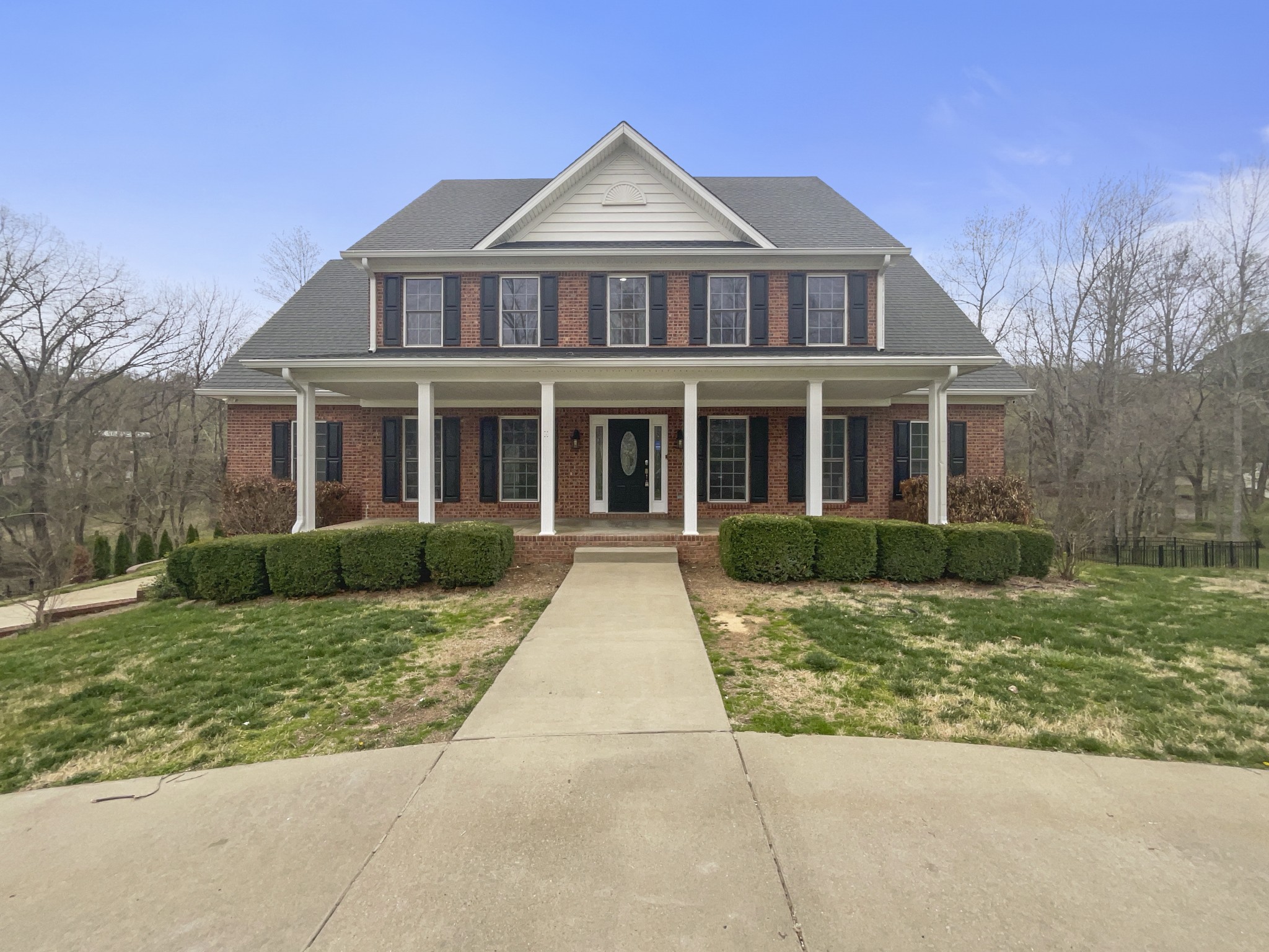 2058 Mossy Oak Circle Clarksville, TN 37043 - Photo 6 of 38 a front view of a house with a yard