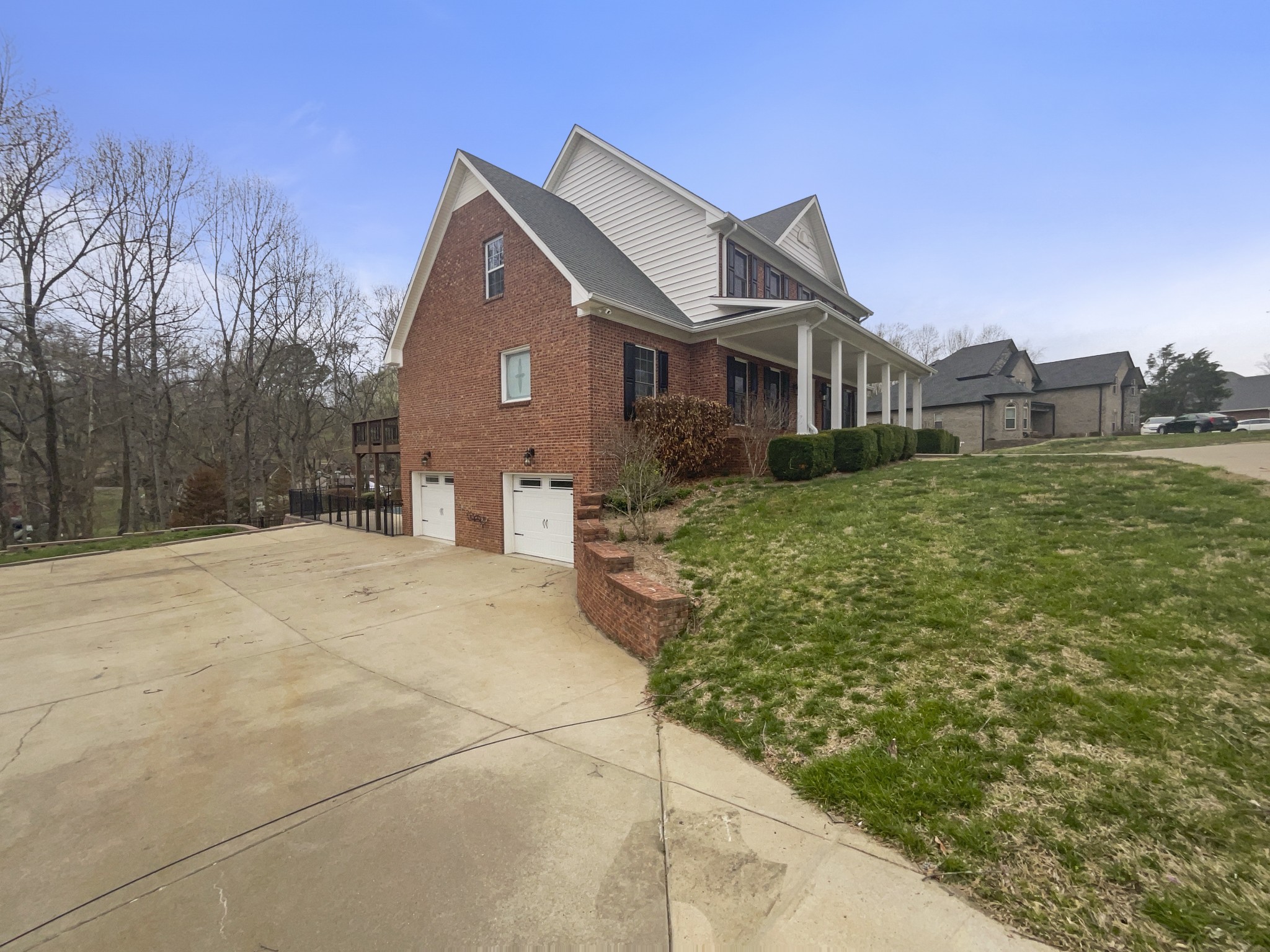 2058 Mossy Oak Circle Clarksville, TN 37043 - Photo 7 of 38 a front view of a house with a yard