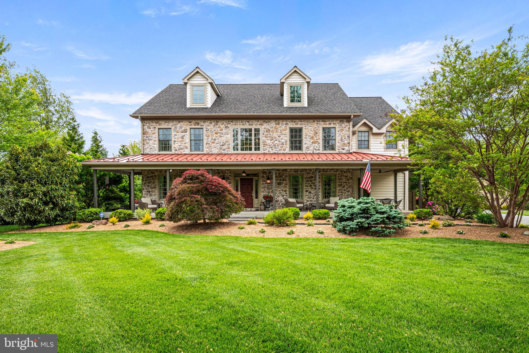 1548 Morstein Road Malvern, PA 19355 - Photo 4 of 80 a front view of a house with a yard