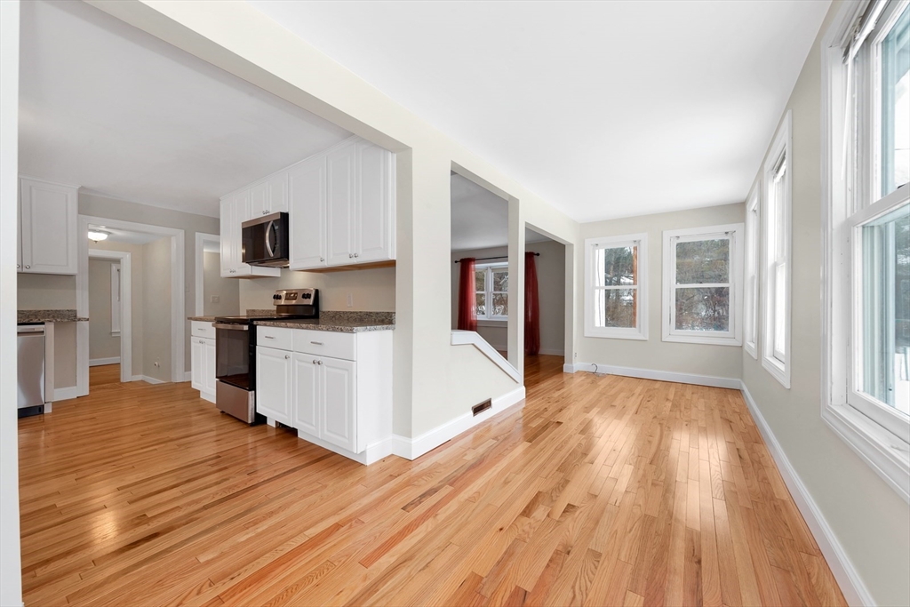 92 Squannacook Road Shirley, MA 01464 - Photo 6 of 22 a view of kitchen with wooden floor and electronic appliances