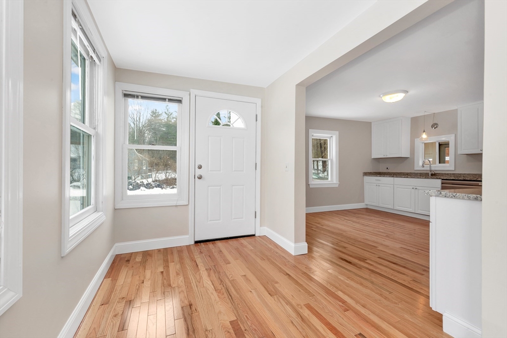 92 Squannacook Road Shirley, MA 01464 - Photo 7 of 22 a view of kitchen and wooden floor