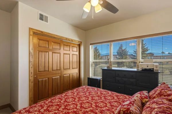 a bathroom with a double vanity sink mirror and double vanity