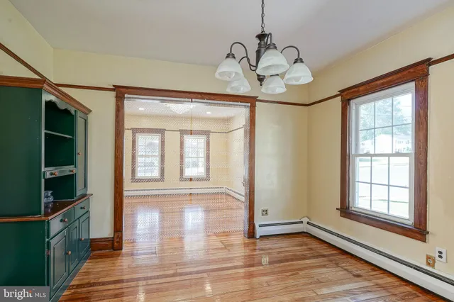 a view of an entryway and a chandelier