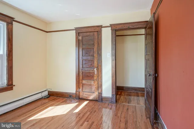 wooden floor and window in a room