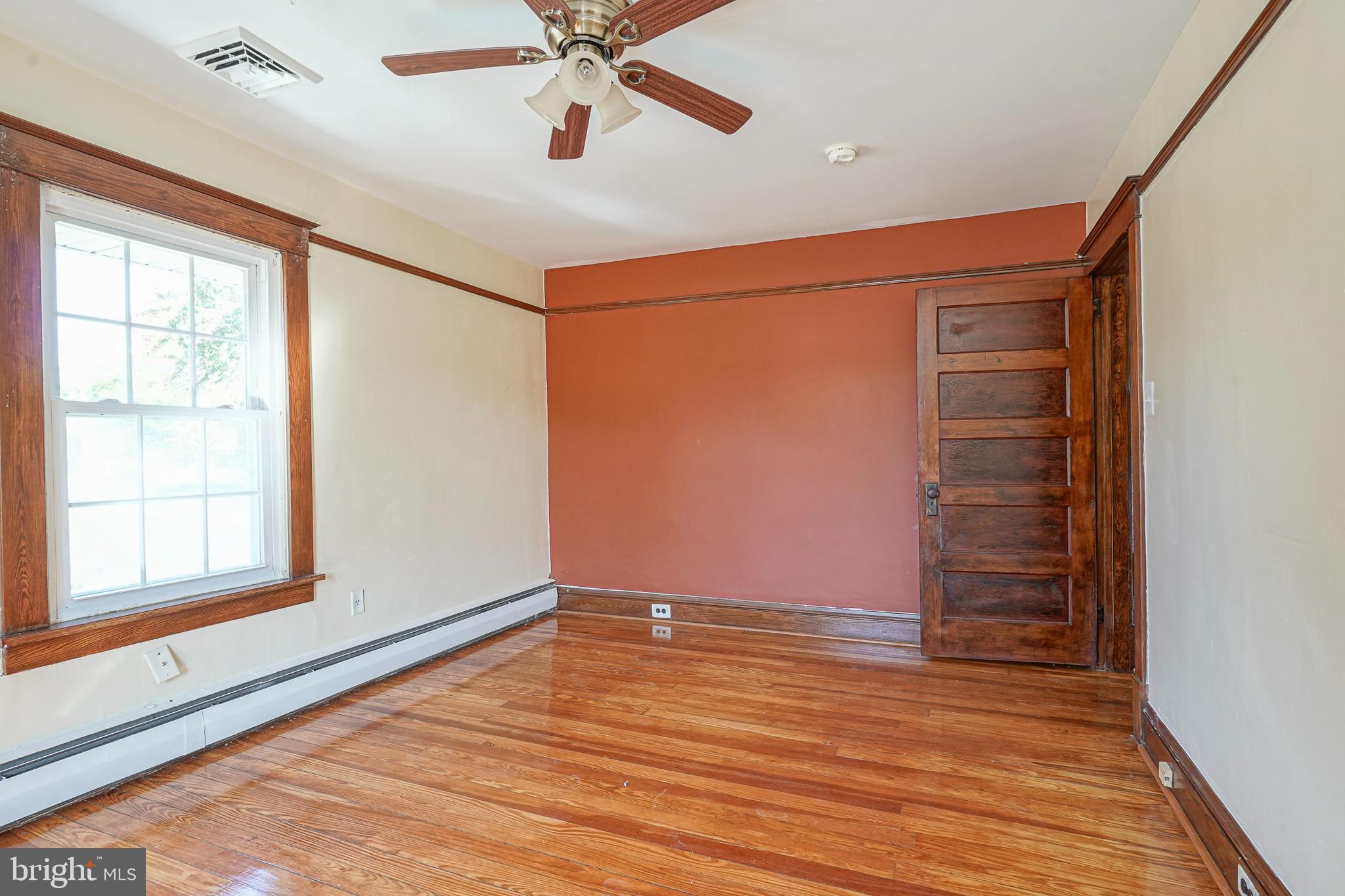 166 East Evesham Road Cherry Hill, NJ 08003 - Photo 20 of 34 wooden floor in an empty room with a window