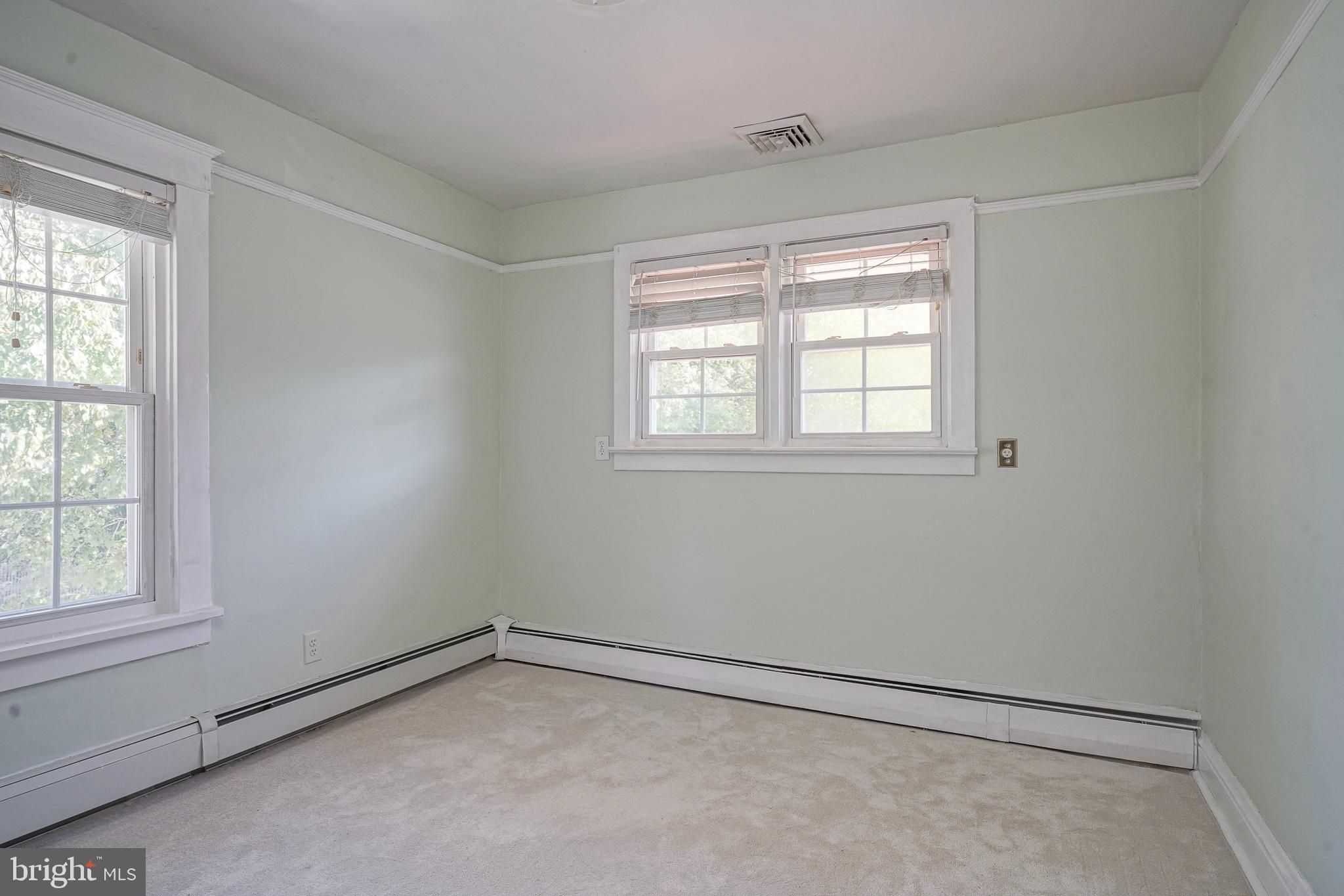 166 East Evesham Road Cherry Hill, NJ 08003 - Photo 27 of 34 an empty room with a window