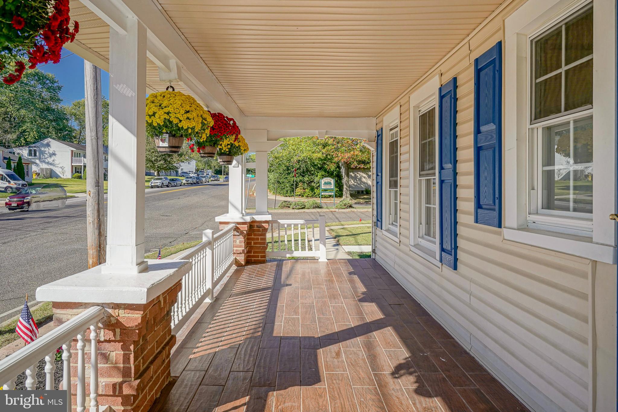 166 East Evesham Road Cherry Hill, NJ 08003 - Photo 4 of 34 a view of balcony with floor to ceiling windows and wooden floor