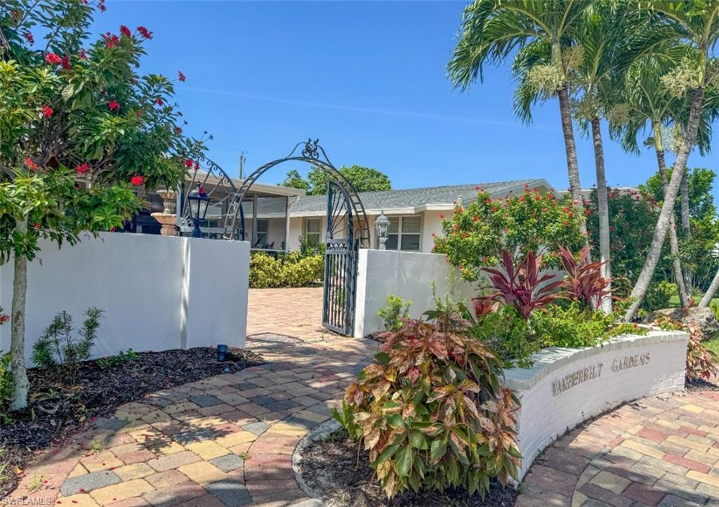 746 109th Avenue North Naples, FL 34108 - Photo 19 of 22 a view of a garden with plants