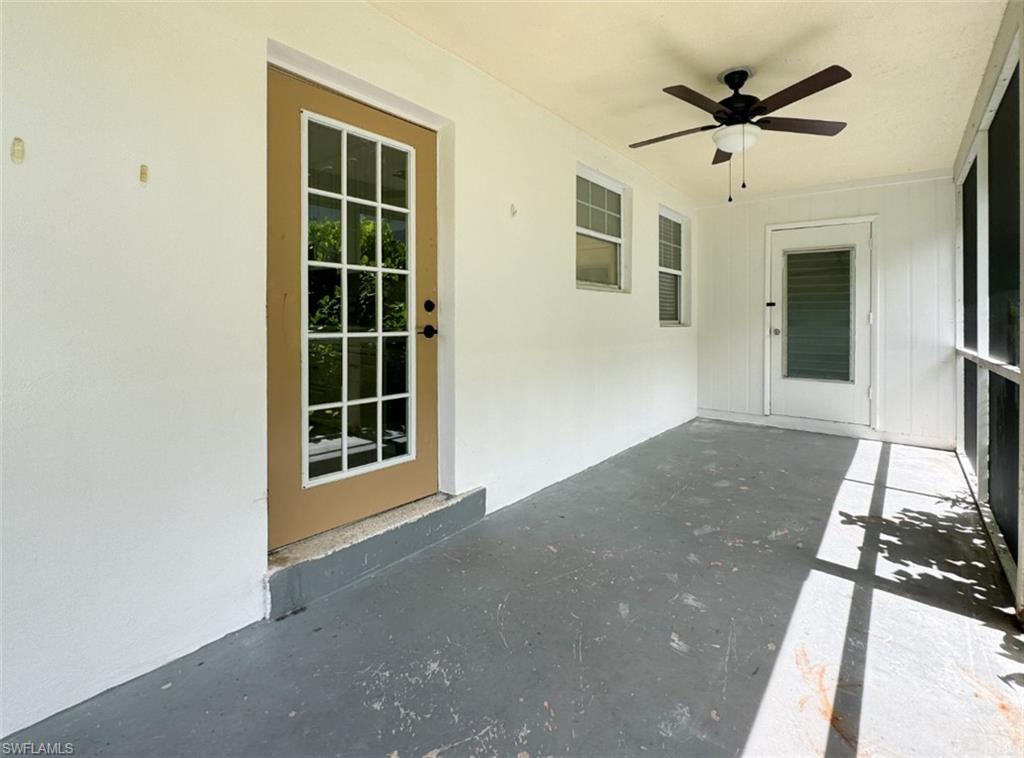 746 109th Avenue North Naples, FL 34108 - Photo 3 of 22 a view of an empty room with a window