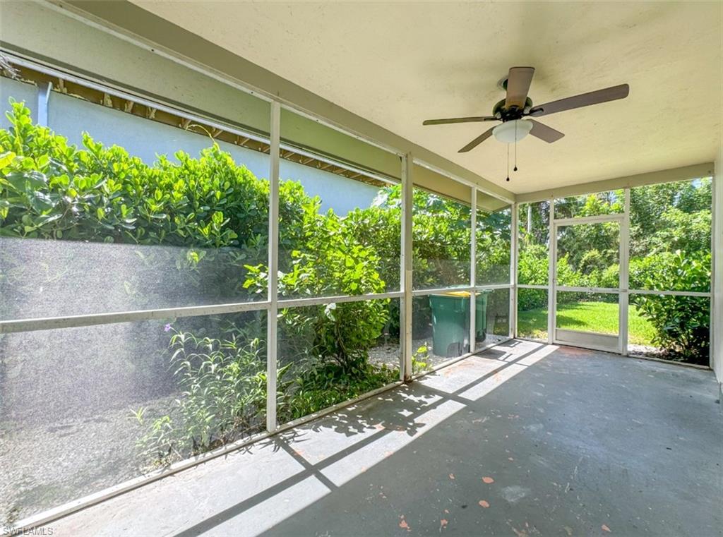 746 109th Avenue North Naples, FL 34108 - Photo 4 of 22 a view of a porch with potted plants
