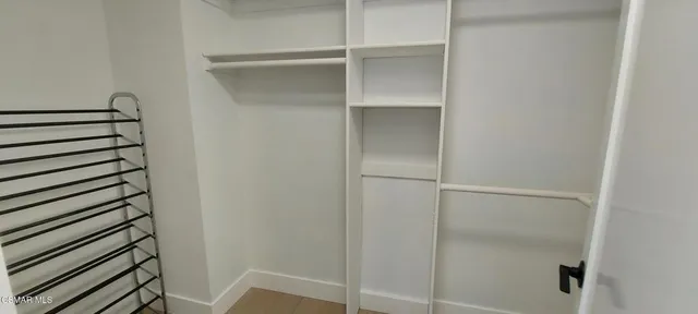 a view of a room with rack on the wall