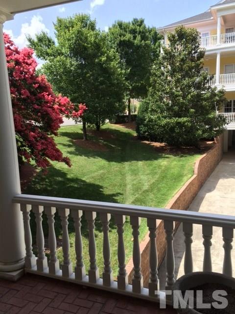 7510 Lead Mine Road, Unit 106 Raleigh, NC 27615 - Photo 19 of 22 a view of a wooden fence