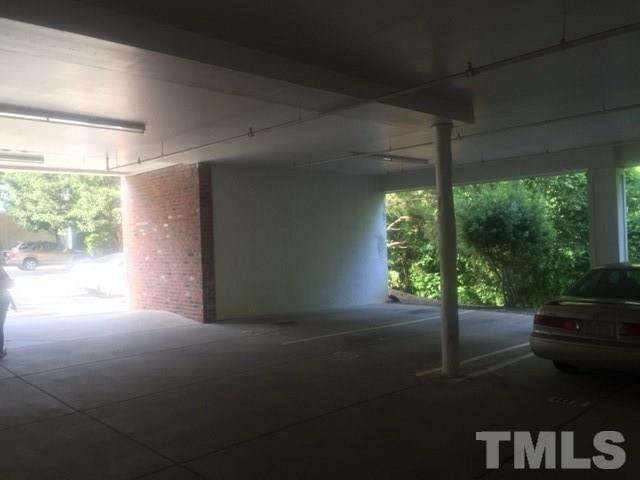 7510 Lead Mine Road, Unit 106 Raleigh, NC 27615 - Photo 21 of 22 a view of backyard and porch
