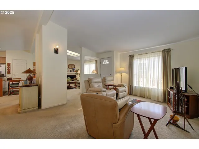a kitchen with a sink stove and refrigerator