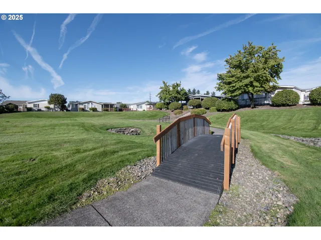 a view of a backyard with furniture