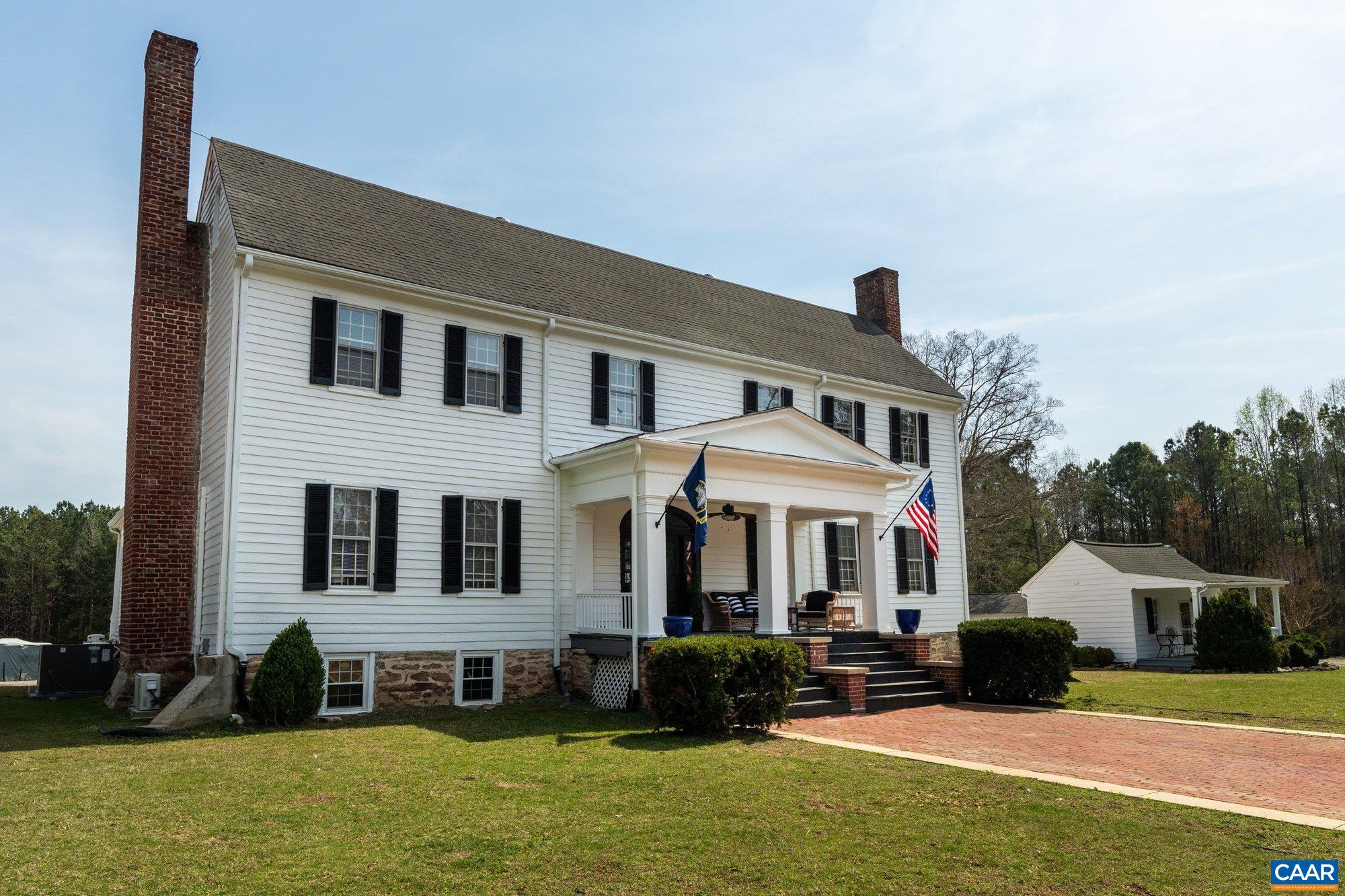 14910 Western Mill Road Lawrenceville, VA 23868 - Photo 13 of 73 a front view of a house with a yard